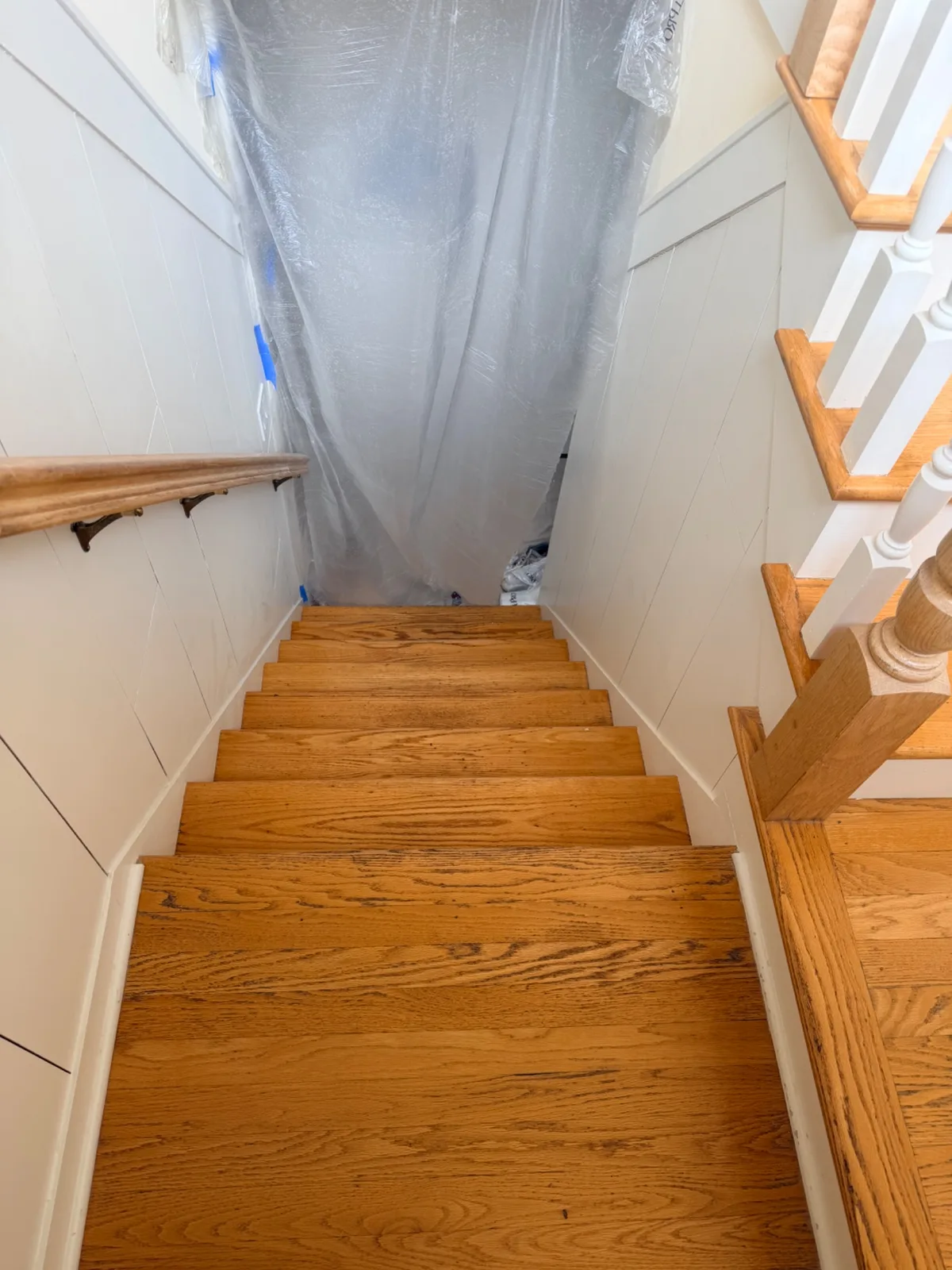 A set of wooden stairs in Trumbull with a fresh coat of poly finish.